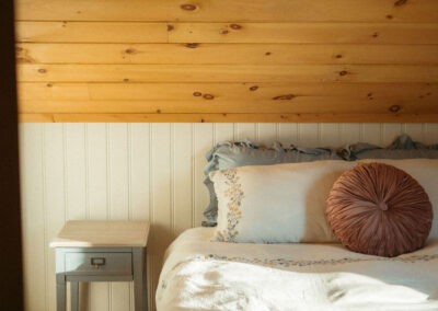 The Loft at The Roost Farm & Market: queen bed and nightstand