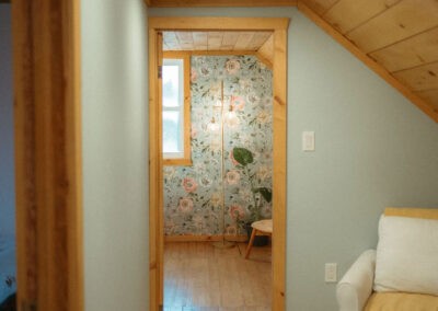 The Loft at The Roost Farm & Market: hallway view to the reading corner